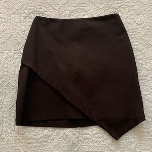 Black skirt with asymmetrical detail